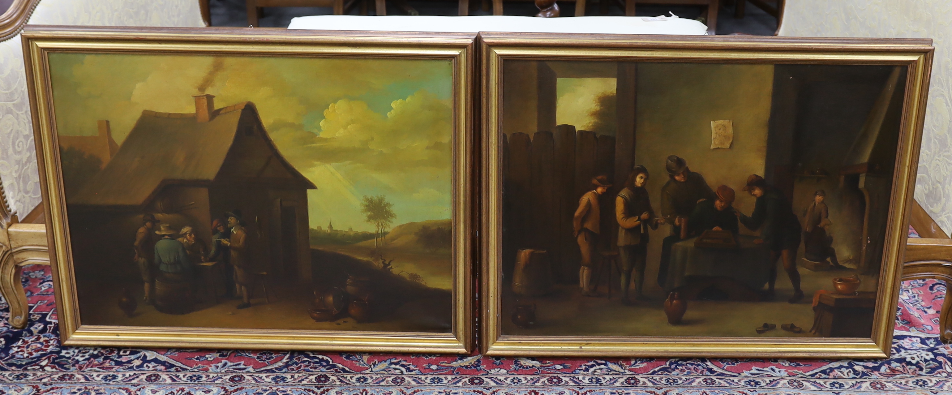 Dutch School, pair of oils on canvas, Tavern scene and Pastoral landscape, each with Galleria D'Arte inscribed labels verso, unsigned, 59 x 79cm